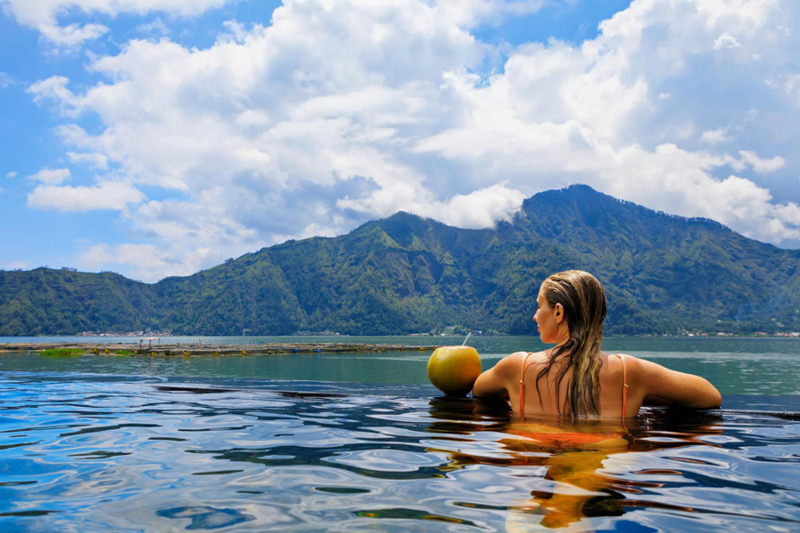 Relaxing in a Hot Spring with Mountain Views Bali Hot Sring